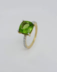 Ring mit 0,26ct TW-si Brillant und 3,64ct Peridot in 750/18K Gelbgold Gr. 54