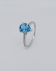 Ring mit 0,09ct TW-si Diamant und 1,87ct Blautopas in 750/18K Weißgold Gr. 54