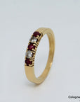 Ring mit ca. 0,10ct TW-vs Brillant und ca. 0,15 Rubin in 750/18K Gelbgold Gr. 60