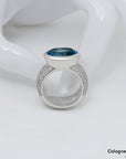 Ring mit 1,47ct TW-vvs Brillant + Blautopas Besatz in 750/18K Weißgold Gr. 56