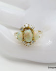 Ring mit ca. 0,30ct W-si Brillant und Opal Besatz in 585/14K Gelbgold Gr. 57