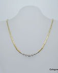 Collier im Verlauf mit ca. 0,26ct W-si Brillant in 750/18K Weiß-/Gelbgold